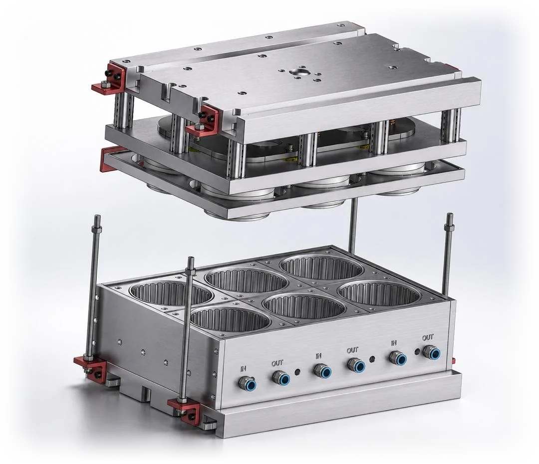 A Yong Heng pressure box with its cooling system and inlet and outlet ports.